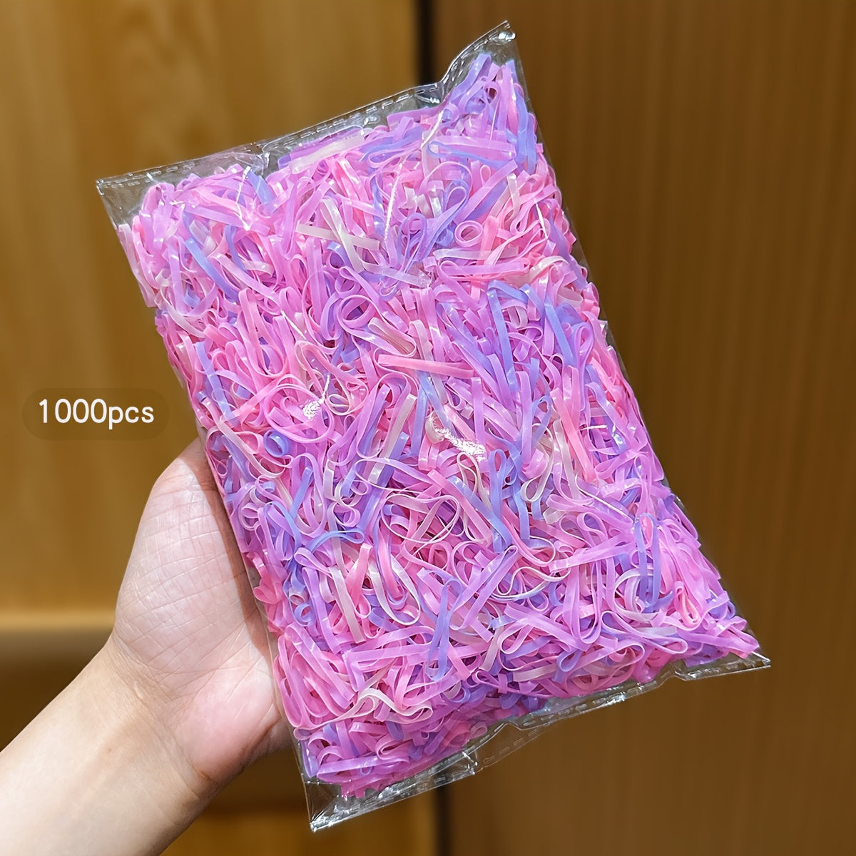 Paquete de 1,000 Ligas Pequeñas Desechables para el Cabello en Tonos Pastel (Rosa y Lila)