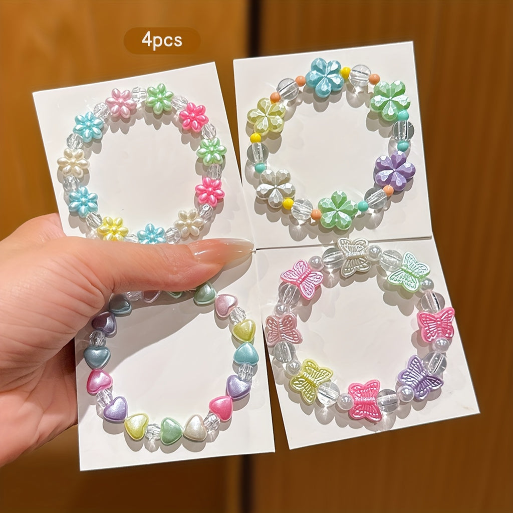 Conjunto de 4 Pulseras Infantile de Cuentas con Dijes Coloridos de Mariposas, Flores y Corazones (Estilo Pastel)