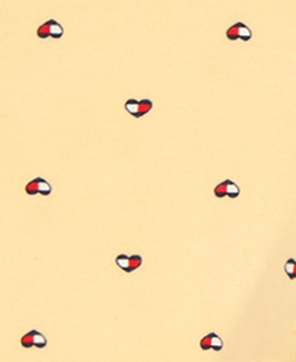 Mono con Pies Manga Larga Tommy Hilfiger | Corazones Bandera Allover | Amarillo Vainilla | Bebé/Niña (0/3M - 3/6M)