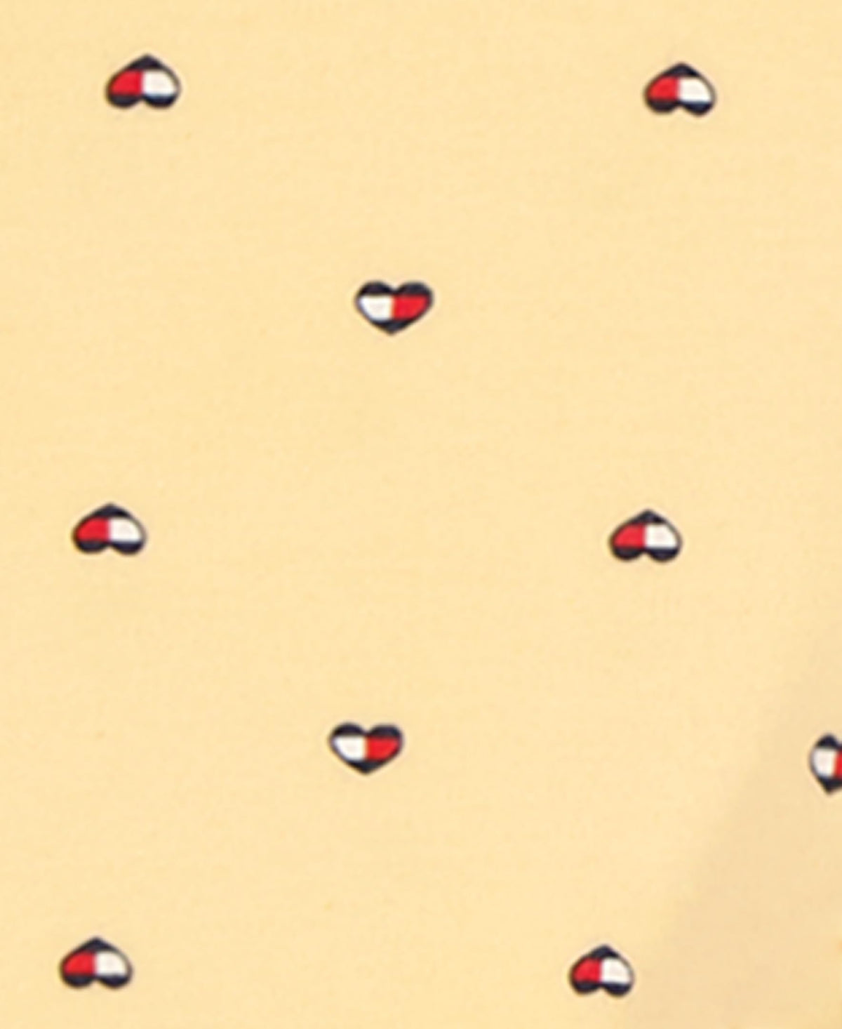 Mono con Pies Manga Larga Tommy Hilfiger | Corazones Bandera Allover | Amarillo Vainilla | Bebé/Niña (0/3M - 3/6M)