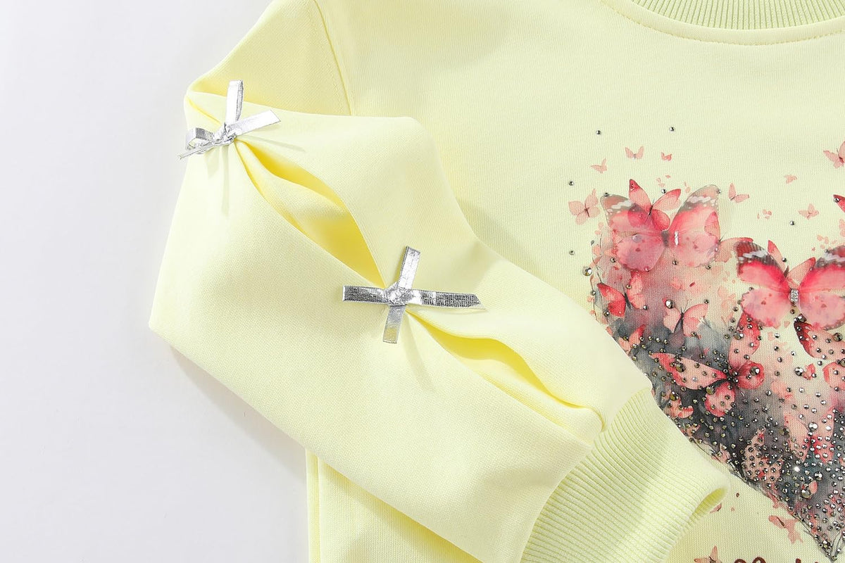 Conjunto 2 Piezas para Niña: Sudadera Amarilla Corazón Mariposas con Strass y Lazos 3D y Jeans con Mariposas y Lazos Bordados