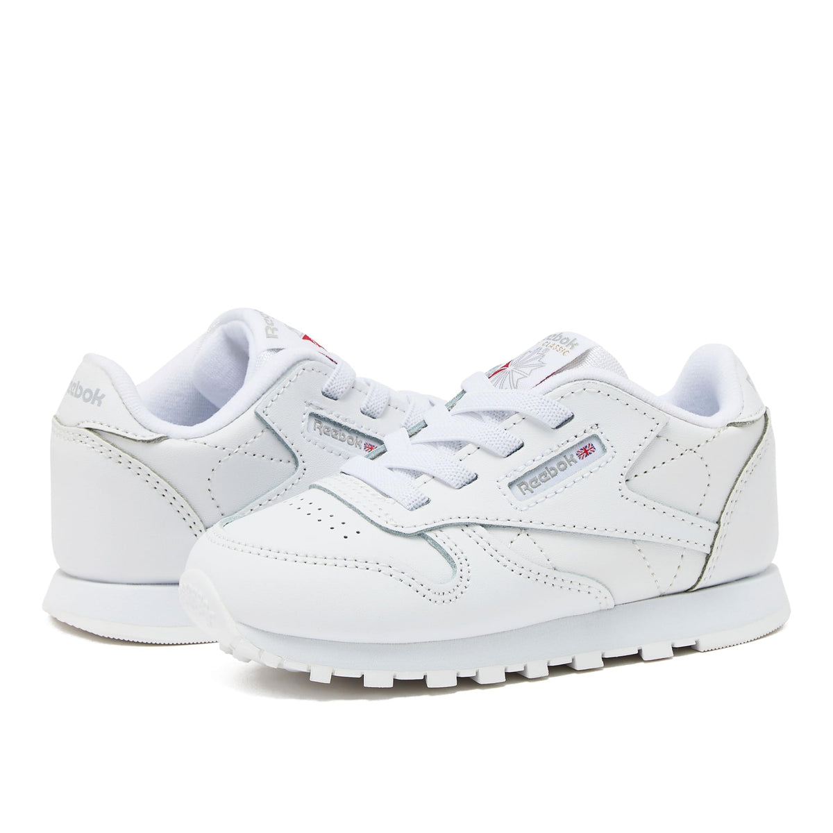 Reebok  -Tenis Casuales de Piel Reebok Classic Leather con Cordones para Niños (Blanco/Blanco) (Talla 20 - 26)