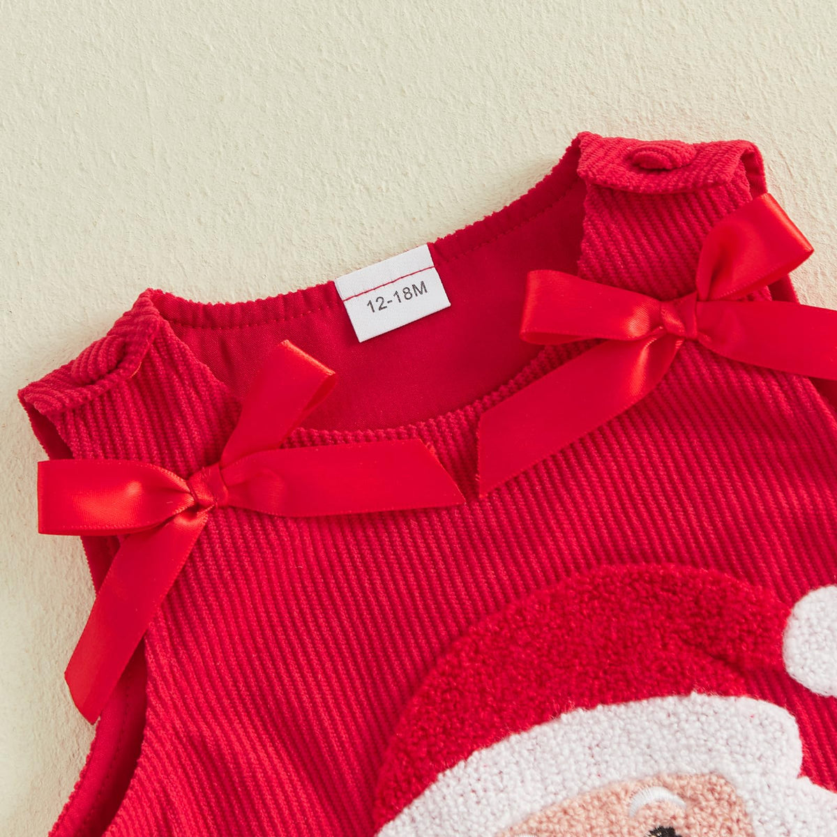 Santa Face Rojo | Vestido Pana Roja Nina Sin Mangas + Cuello Redondo + Aplicacion Papa Noel 3D + Lazos