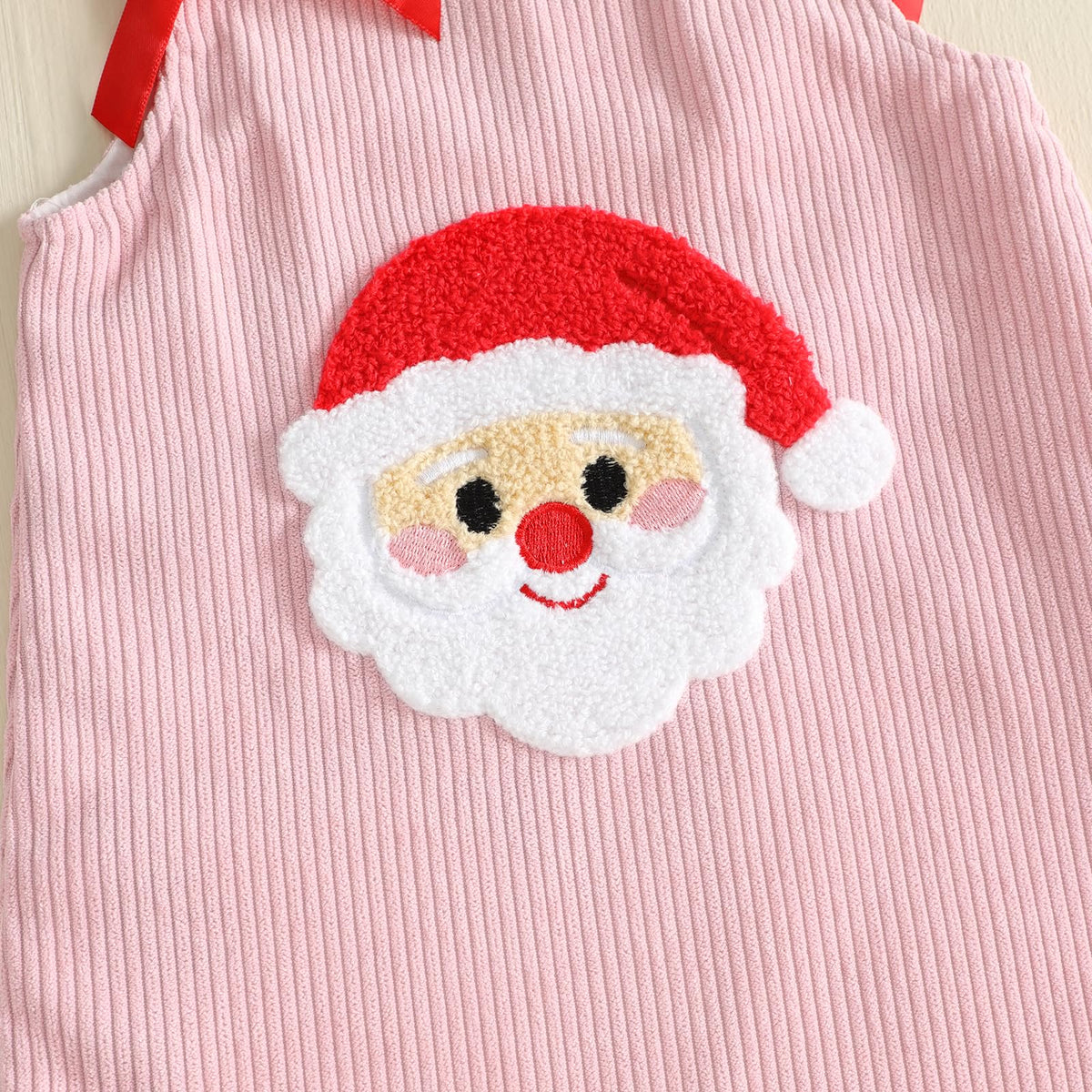 Santa Corduroy Pink Girl | Vestido Pana Rosa Niña — Sin Mangas + Cuello Redondo + Aplicación Papa Noel 3D + Lazos Rojos + Botones Blancos