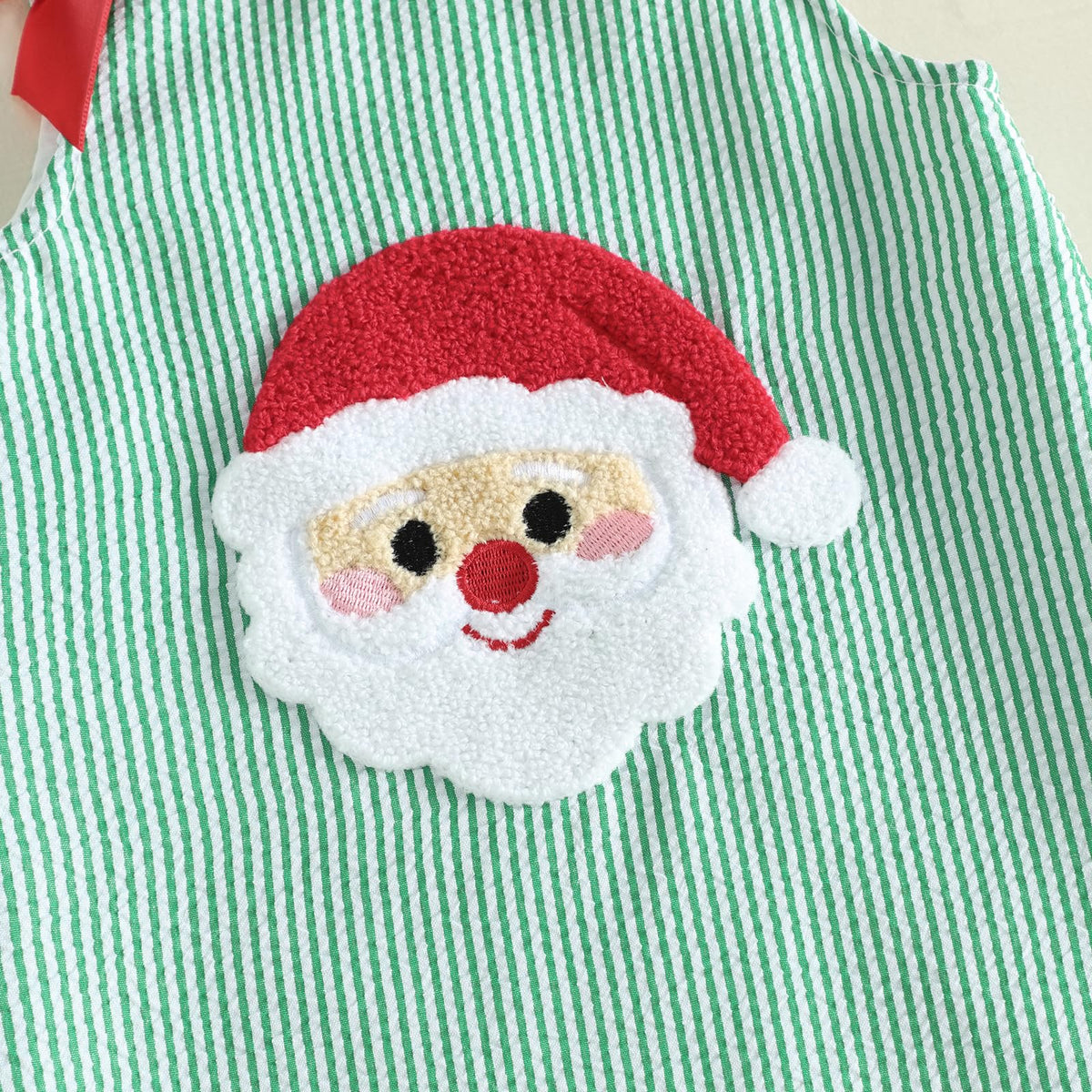 Santa Seersucker Green Girl | Vestido Rayas Verde/Blanco Niña — Sin Mangas + Cuello Redondo + Aplicación Papa Noel 3D + Lazos Rojos