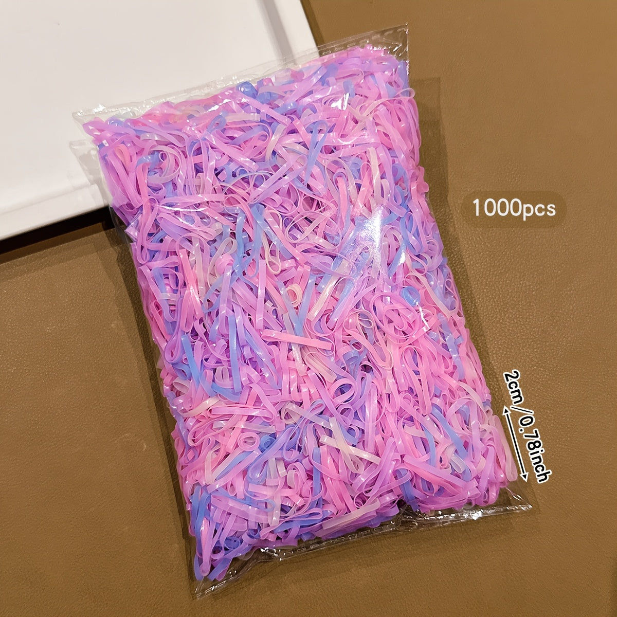 Paquete de 1,000 Ligas Pequeñas Desechables para el Cabello en Tonos Pastel (Rosa y Lila)