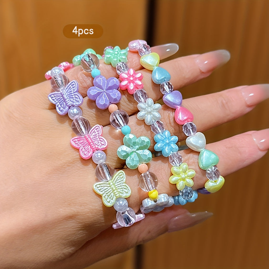 Conjunto de 4 Pulseras Infantile de Cuentas con Dijes Coloridos de Mariposas, Flores y Corazones (Estilo Pastel)
