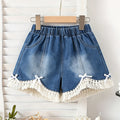 Shorts de Mezclilla Lavada para Niñas con Borlas y Lazos Decorativos (Estilo Casual y de Moda para Verano) (Talla 4Y y 5Y)