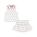 Conjunto 2 Piezas Tommy Hilfiger | Polo Sin Mangas + Skort | Logos Allover Blanco | Niña/Bebé (3M - 18M)