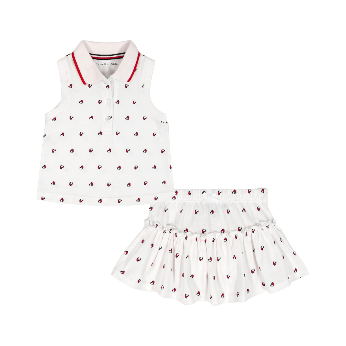 Conjunto 2 Piezas Tommy Hilfiger | Polo Sin Mangas + Skort | Logos Allover Blanco | Niña/Bebé (3M - 18M)
